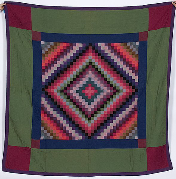 Sunshine and Shadows Amish Quilt : Sunshine and Shadows Amish Quilt Possibly Pennsylvania, 20th century, a Sunshine and Shadows pieced quilt, constructed of multicolor cotton and synthetic solids with a printed floral back, in a grap