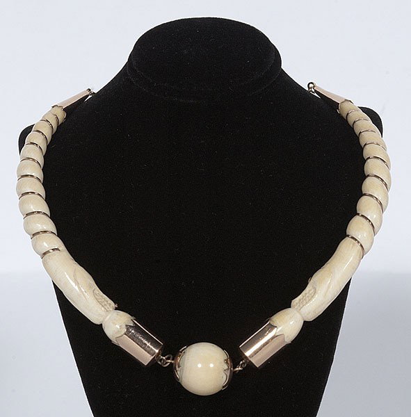 Asian Carved Ivory Gold Necklace : Asian Carved Ivory Gold Necklace Ca 1940s, an ivory tusk necklace with spiral carved sides wrapped in 18K gold wire, and terminating in dragon heads, centered with an ivory ball, marked 750 / valor 