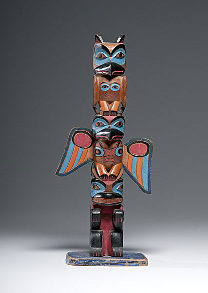Northwest Coast Painted Totem : Northwest Coast Painted Totem Three figure totem painted in blue, red, orange, and black; mounted on painted base, height 20.5 in. second quarter 20th century John Wesley Snyder Collection (1895-1
