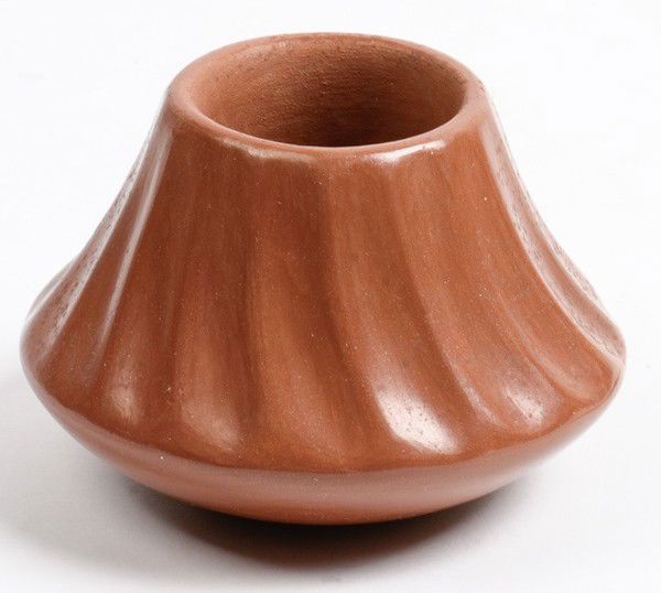 Juanita Fragua Jemez Redware Jar : Juanita Fragua Jemez Redware Jar with melon design; signed Juanita Fragua Jemez Pue./ NM, height 2.5 in. x 3.75 in. third quarter 20th century