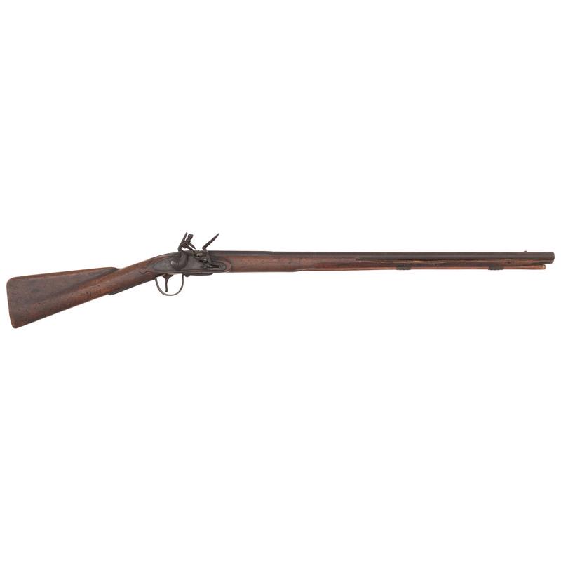 Period Shortened Flintlock Northwest Trade Gun by Leman: .58 caliber. 30" pinned three-stage octagon to round barrel with baluster turned rings at the transition. SN: NSN. Heavily oxidized brown metal, brass and iron furniture, walnut stock. Slightly convex