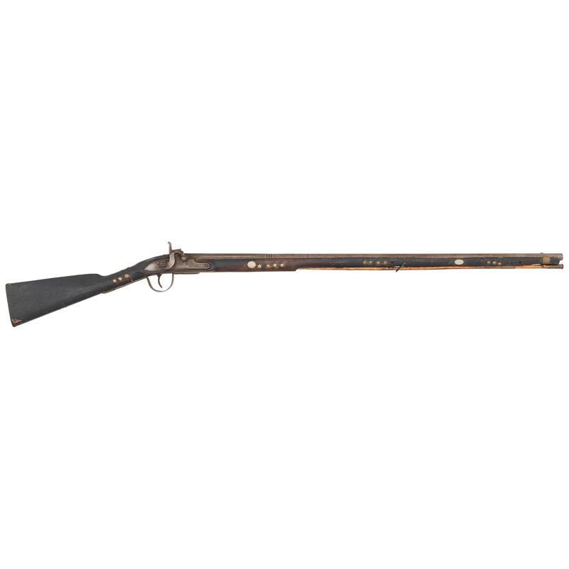 Percussion Altered Tack Decorated Chief's Grade Northwest Trade Gun by Tryon: .58 caliber. 36" 3-stage octagon to round pinned barrel. SN: NSN. Bright finish, brass and iron furniture, full-length walnut stock. Percussion altered flint lock marked "TRYON/PHILADA" in two vertica