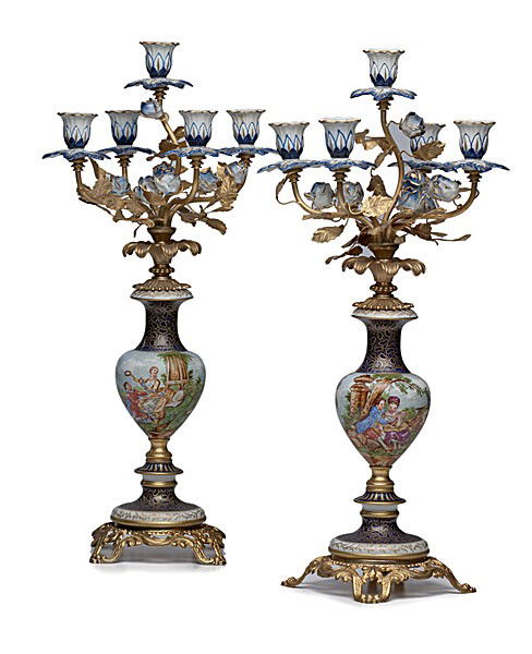 Sevres Neo-Classical Candleabra's : Sevres Neo-Classical Candleabra's Pair of neo-classical candelabras each having five flower-form candle holders and intertwining gold gilt leaves, supported on a urn-shape vase decorated with classi