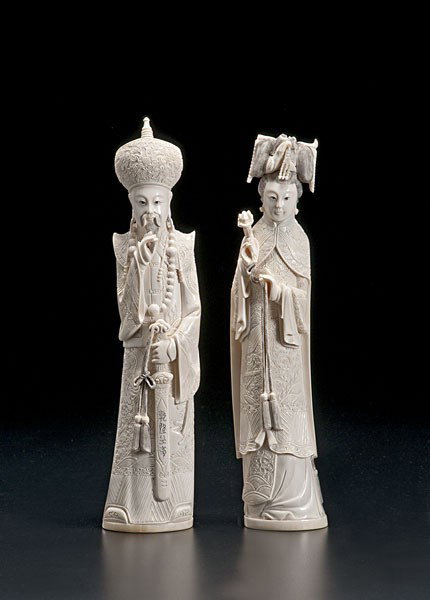 Pair of Chinese Carved Ivory Figures : Pair of Chinese Carved Ivory Figures Chinese, a pair of carved ivory tusks, one depicting the Qianlong Emperor, each marked on underside; ht. 12.5 in. Ex Property Reserve National Insurance Compan