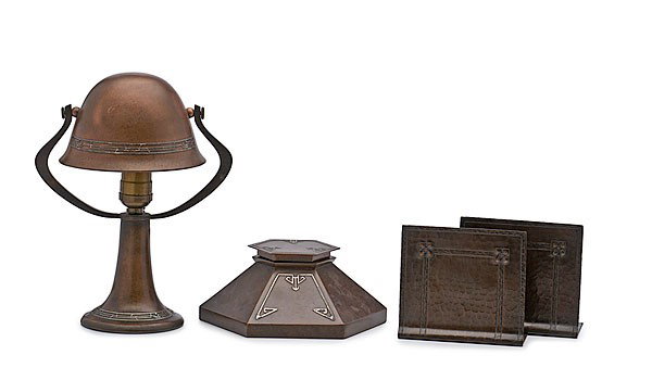 Heintz Silver on Bronze Desk Items : Heintz Silver on Bronze Desk Items American, early 20th century. A group of three Heintz items, including a silver on bronze helmet desk lamp; ht. 10.5 in;, a silver on bronze bookends and inkwell, 