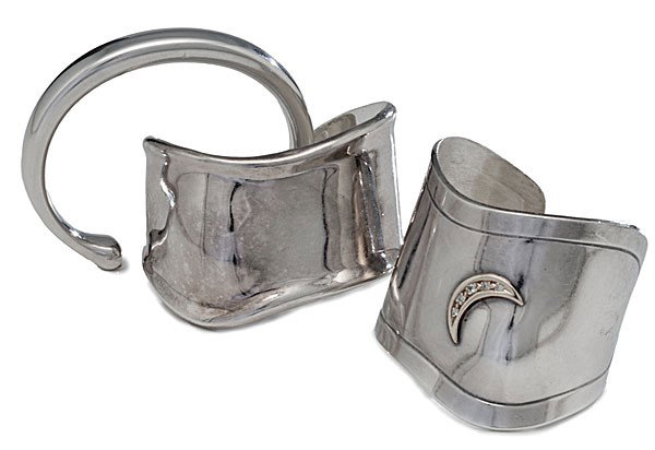 Georg Jensen Sterling Bracelet, Plus : Georg Jensen Sterling Bracelet, Plus A lot of three sterling bracelets, including a Georg Jensen marked bangle; Plus two sterling cuff bracelets, one marked Mexico / Taxco, the other having a 14K go