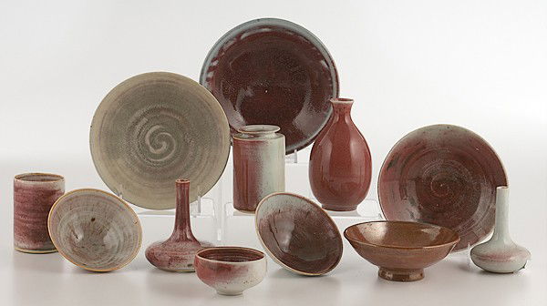 Potters' Market: John Davis Group of Twelve Porcel: John Davis Group of Twelve Porcelain Works Group of twelve studio porcelains, including six bowls, a tea bowl, a tumbler, and four vases, all having a gray to red glaze, all signed Davis, ca 1990; l