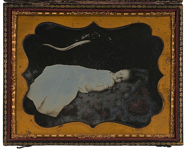 Half Plate Post-Mortem Daguerreotype of a Baby by : Half Plate Post-Mortem Daguerreotype of a Baby by Ball & Thomas, Cincinnati, Ohio A half plate daguerreotype of a deceased baby in a white frock, accompanied by a handwritten note that misidentifies