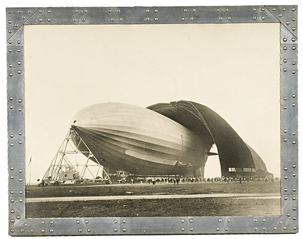 Margaret Bourke-White Photograph of the U.S.S. Akr: Margaret Bourke-White Photograph of the U.S.S. Akron Silver gelatin photograph signed lower left Bourke-White, documenting the maiden launch of this airship from the air dock in Akron, OH, 17 x 23 i