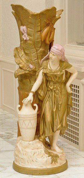 ROYAL DUX PORCELAIN FIGURAL: ROYAL DUX PORCELAIN FIGURAL Bohemian, a large figural of maiden with water jug, marked with the Royal Dux seal; 36.75" high. .