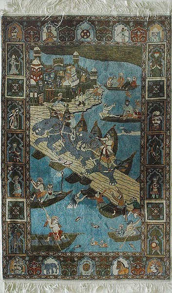 MUGHAL-STYLE HAND-WOVEN PICTORIAL RUG: MUGHAL-STYLE HAND-WOVEN PICTORIAL RUG With scenes of elephants crossing bridge into Indian city, border with warriors and elephants. 55" x 84" (4'7" x 7') (140 x 213.5cm).