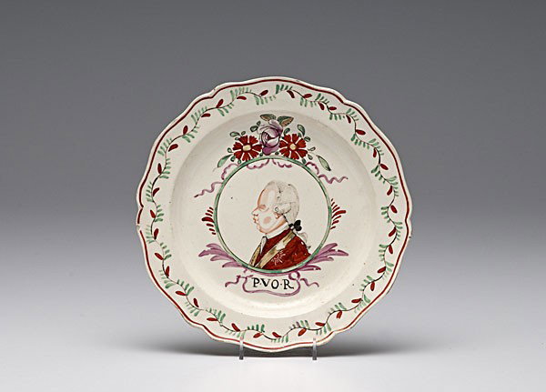 Prince William of Orange Creamware : Prince William of Orange Creamware English, 18th century. A Dutch-decorated creamware plate with wave edge, central bust-length profile portrait believed to be Prince William V, above his initials P