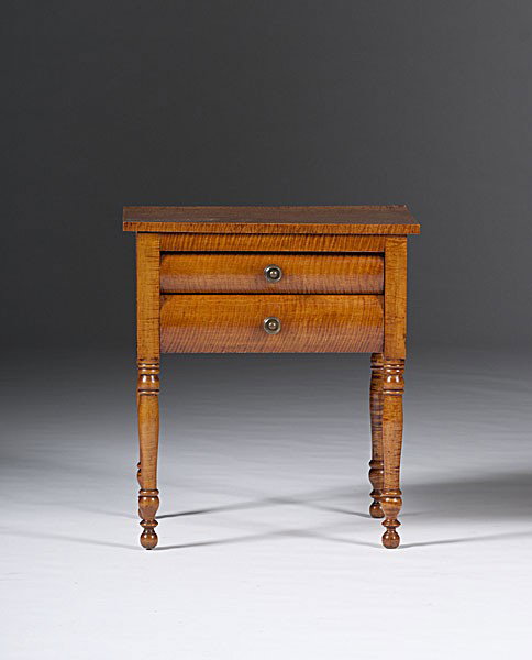 Tiger Maple Work Table : Tiger Maple Work Table American, possibly Ohio, ca 1825-1830. A Sheraton stand in tiger maple with pine secondary, having two drawers with bowed faces, over turned legs ending in ball feet; ht. 27.5