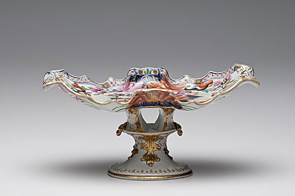 Mason Ware Ironstone Compote : Mason Ware Ironstone Compote English, early 19th century. An ironstone compote, in two parts, the oval top with ruffled edge, and out-turned ends, in polychrome imitation of Chinese Tobacco Leaf pat