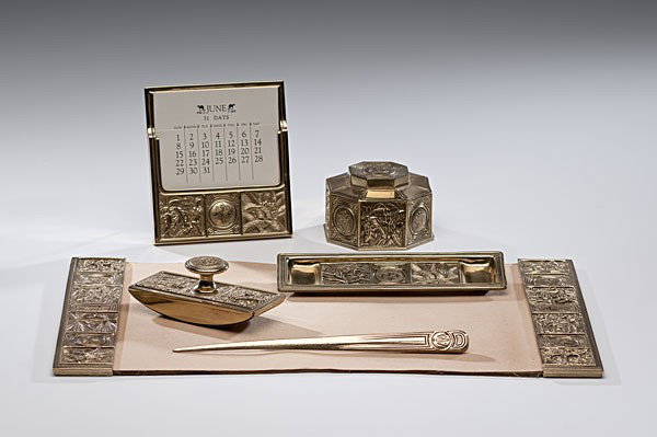 Tiffany Gold Dore Desk Set : Tiffany Gold Dore Desk Set American, a Tiffany Studios six piece gold dore desk set in the Bookmark pattern including a letter opener, inkwell, pen tray, rocker blotter, desk blotter with pad, and a