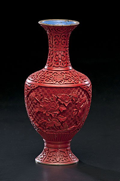 Chinese Cinnabar Vase : Chinese Cinnabar Vase Chinese, a cinnabar vase with floral and scroll motifs, unmarked, with blue glazed bottom and interior; ht. 9 in.