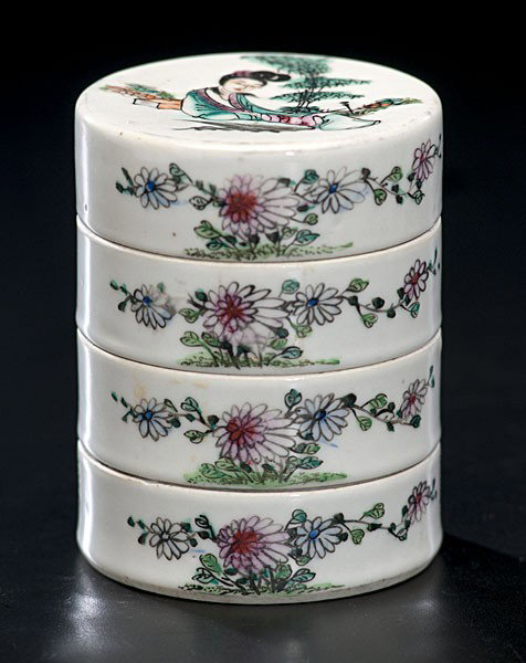 Chinese Porcelain Stack Pot : Chinese Porcelain Stack Pot Chinese, a porcelain stack pot with four trays and having characters among floral painted motifs; ht. 4 in.