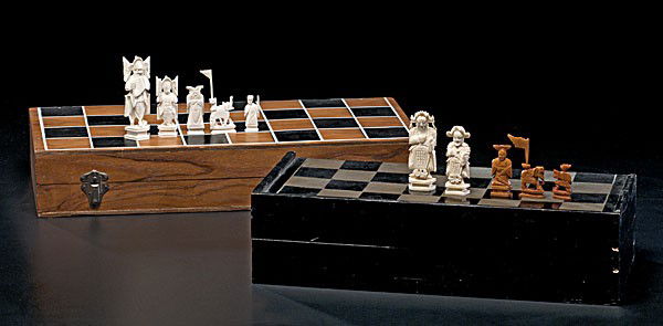 Chinese Carved Ivory Chess Sets : Chinese Carved Ivory Chess Sets Chinese, a pair of carved ivory chess sets with ivory pieces and original wooden chess board with metal clasp closures; largest board 16 x 15.5 in. tallest ivory piec