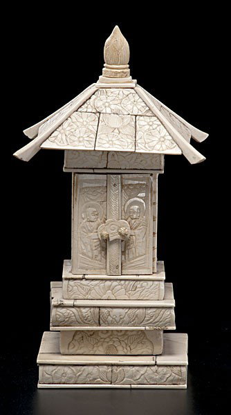 Bone Buddhist Temple : Bone Buddhist Temple Asian, a small shrine in carved and inked bone with two doors which open to reveal a sitting Buddha, on top of a four-tiered base; ht. 8.75 in.