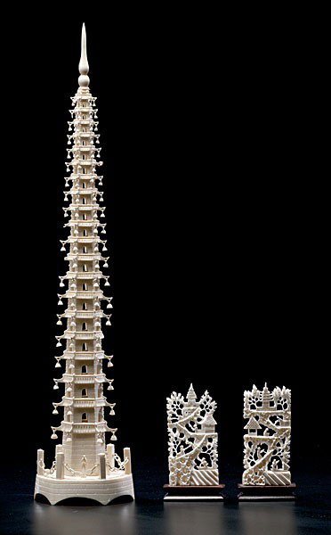 Chinese Ivory Buddhist Tower, Plus : Chinese Ivory Buddhist Tower, Plus Chinese, includes a carved ivory Buddhist tower and pair of carved ivory villages scenes on 20th century wooden stands; ht. 18.75 in.