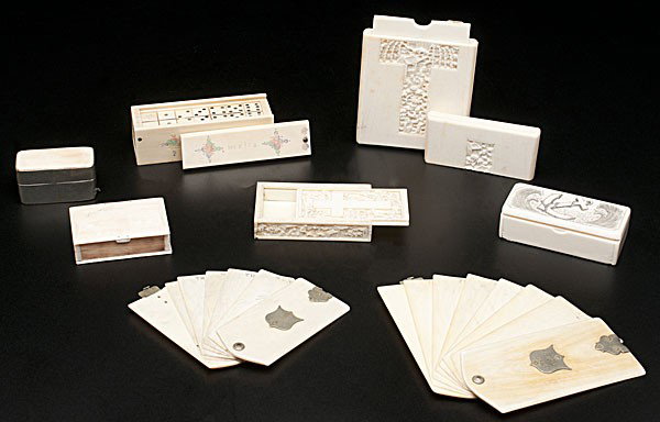 Ivory Boxes : Ivory Boxes An assembled group of eight ivory card cases and boxes, all of various origins, includes two match safes, a dominoes box, three card cases, and two small boxes; largest card case ht. 4.2