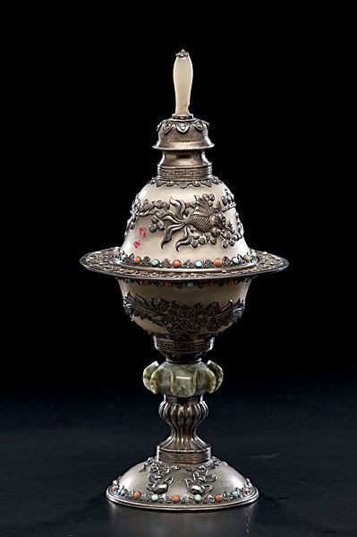 Tibetan Chalice : Tibetan Chalice Tibet, a silver chalice with cover, having inlaid turquoise and coral stones, unmarked; oah 12 in.