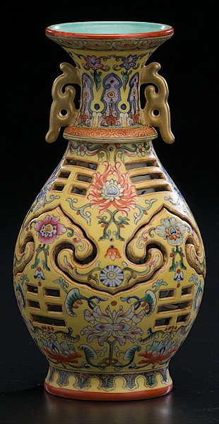 Chinese Reticulated Vase : Chinese Reticulated Vase Chinese, a reticulated puzzle vase of baluster-form having a flared rim and pierced body with ruyi lappets and I-Ching trigrams, the outer body decorated with flowers and sc