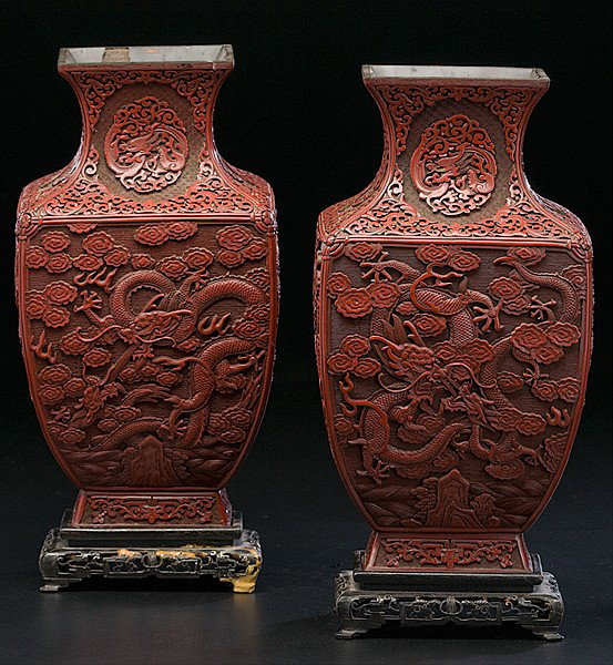 Chinese Cinnabar Vases : Chinese Cinnabar Vases Chinese, 18th/early 19th century, a pair of carved cinnabar vases with dragon designs and six character Qianlong mark on base; ht. 14 in.