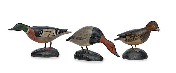 A.E. Crowell Miniature Bluebill Hen Decoys: A.E. Crowell Miniature Bluebill Hen Decoys A.E. Crowell (American, 1862-1951), lot of three, painted wood miniature bluebill hen decoy on wooden stand with artist's name incised on the bottom of one