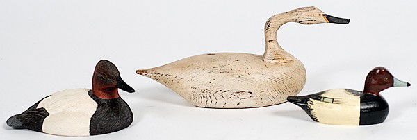 Bird Decoys : Bird Decoys American, lot of three decoys includes a redhead decoy in wood, ca. 1910 by Joe Seme, one canvasback drake in resin signed Joe Weaver 1987, and one wooden decoy incised Ver; largest lg.