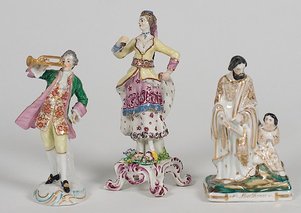 Continental Porcelain Figurines : Continental Porcelain Figurines Continental, 19th century, a group of three porcelain figures including a colonial man with horn, a Continental lady and a religious figure of Moses, all unmarked; la
