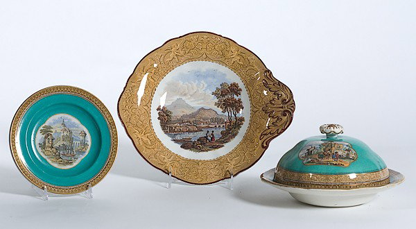 Continental Tablewares : Continental Tablewares Continental, 19th century tablewares, includes one handled footed dish with transfer landscape scene, a Pratt covered dish with decorated panels, a dome lid, and matching plat