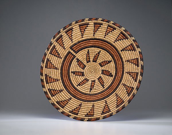 Large Paiute Basket : Large Paiute Basket woven with red and deep purple; design with spirit broken line with triangular devices radiating from center, diameter 29 in. third quarter 20th century
