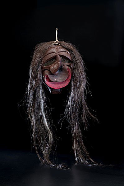 Seneca Broken Nose False Face Mask : Seneca Broken Nose False Face Mask carved of basswood and painted in brown and red; crooked nose and tin eyes; long brown horsehair, length 10 in. x 7 in. mid-20th century