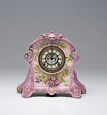 Ansonia La Plata Porcelain Clock : Ansonia La Plata Porcelain Clock American, ca 1904, an 8 day, half hour gong strike clock in a Royal Bonn hand painted case, having an open escapement, signed dial and movement; ht. 12.5 in.