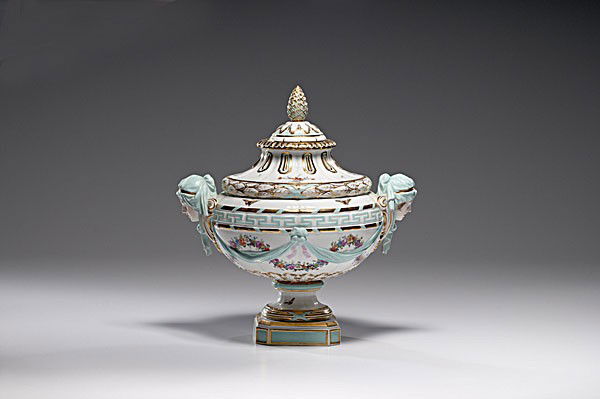 KPM Covered Urn : KPM Covered Urn German, 19th century, a KPM Classical-style covered urn with white body, pale blue swags over painted floral swags, a Greek key border under painted butterflies, the handles shaped a