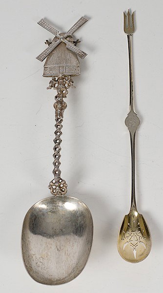 Sterling Silver Spoons : Sterling Silver Spoons American and Dutch, a sterling silver slotted spoon and olive fork combination marked Tiffany and Co. / Sterling and a sterling silver serving spoon with kinetic windmill and 