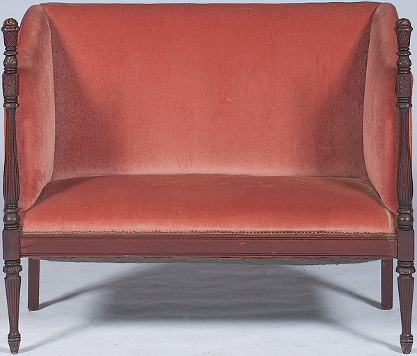 Upholstered Settee : Upholstered Settee Continental, 20th century, an upholstered settee in the French taste with a straight crest, continuous arms, padded back and seat, reeded uprights, and rising on reeded tapering l