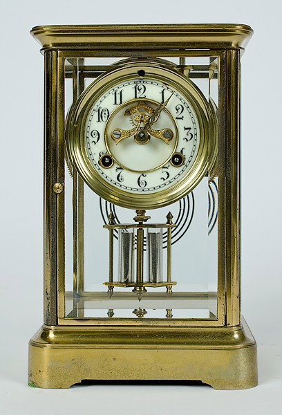 Waterbury Shelf Clock : Waterbury Shelf Clock ca 1910, a Waterbury Clock "Crystal Regulator" mantel clock, with eight day time/strike, gold plated, open escapement; ht. 9, wd. 6, dp. 5 in.