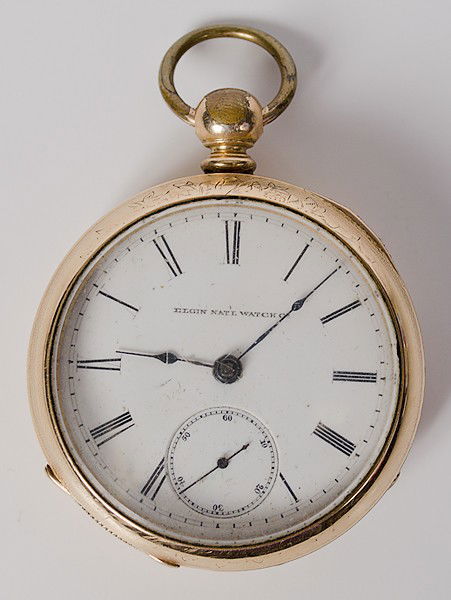 Elgin Pocket Watch : Elgin Pocket Watch American, an Elgin pocket watch marked Elgin Nat'l Watch Co on inside and on face, key wind, in gold filled case, ca 1884, interior with original paper label; dia. 2 in.