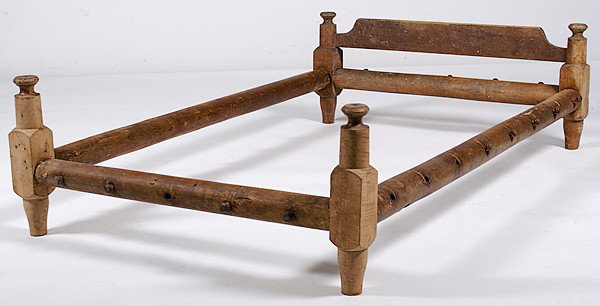 Single Trundle Rope Bed : Single Trundle Rope Bed American, 19th century, a single trundle bed in maple in the manner of Henry Boyd, with block and turned posts, screw post and rails, and still with pegs; ht. 17, wd. 41.5, l