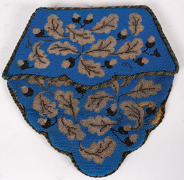 Victorian Beaded Bag : Victorian Beaded Bag American, ca 1870-1900, a flap-over beaded wall bag (without pouch) on a Penelope canvas, backed in blue silk and edged in twisted chord; ht. 11.25, wd. 11.25 in. This bag is an