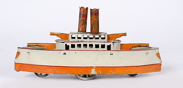 Toy Battleship : Toy Battleship Ca 1910s, a toy battleship modeled after the battle steamers of the Spanish-American/Great White Fleet era, on four metal wheels with an internal flywheel mechanism to sustain momentu