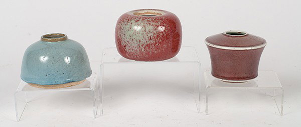 Chinese Water Pots : Chinese Water Pots Chinese, three water pots, including a peachbloom-glazed compressed globular form water pot, a pastel blue-glazed beehive water pot, and a red glazed cylindrical waterpot with eve