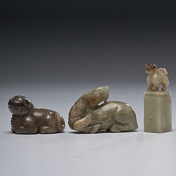 Chinese Jade Beast Carvings : Chinese Jade Beast Carvings Chinese, 18th and 19th centuries. Including a celadon jade foo dog seal with russet markings (18th century); a jade bear, pierced with suspension (18th century); and a ja
