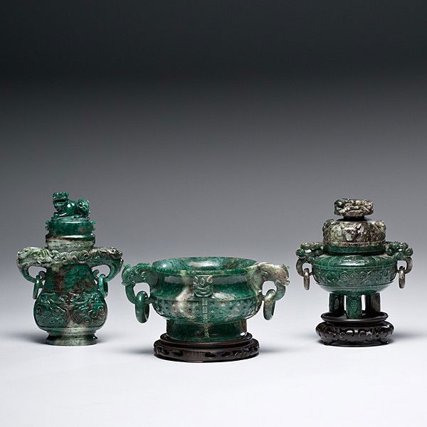 Jade Vessels : Jade Vessels Chinese, an assembled group of unmarked jade vessels including a lidded baluster form vessel with a mythological beast finial and handles with loose rings and archaistic designs on the