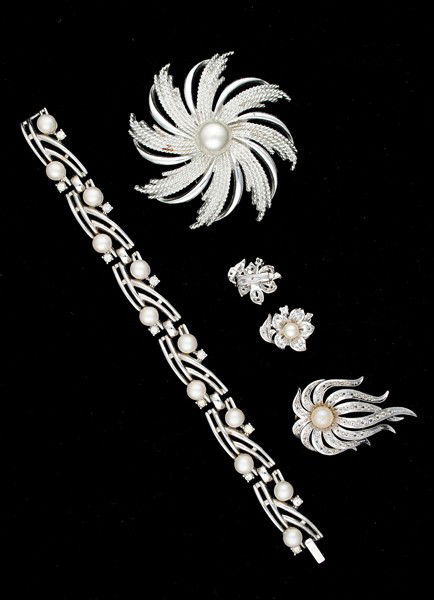 Sarah Coventry, Trifari & G.H. Costume Jewelry Grou: A Sarah Coventry faux pearl brooch, a Trifari faux pearl link bracelet, a G.H. matching earring and brooch faux pearl set; all signed pieces are stamped.