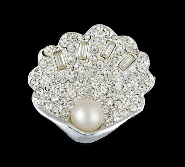 Weiss Seashell Brooch : A Weiss seashell brooch; all signed pieces are stamped.