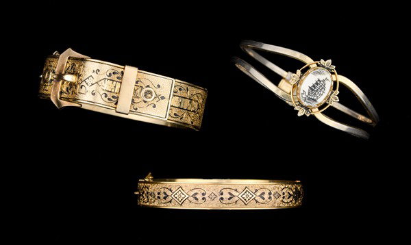 Unsigned Vintage Gold Filled Bangle Bracelet Collec: A 14K GF buckle bracelet with enameled detailing and safety chain, a 10K gold filled bracelet with enameled detailing and safety chain, a gold colored bangle with an etching of a ship as a main focal 