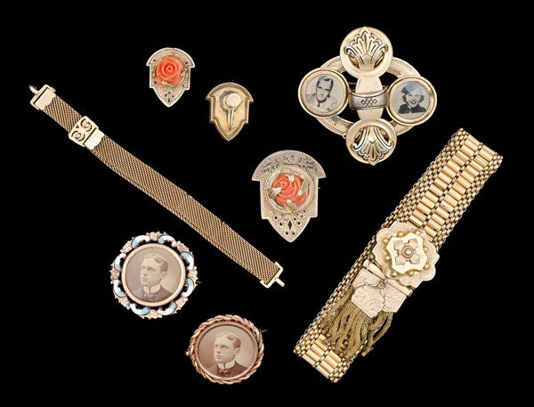 Memorabilia Costume Jewelry Collection : A Victorian styled gilt bracelet with seed pearls, a gilt mesh bracelet with a simple clasp, a commemorative pin with dual photo's, two matching commemorative pins and a coral rosette pin with matchin